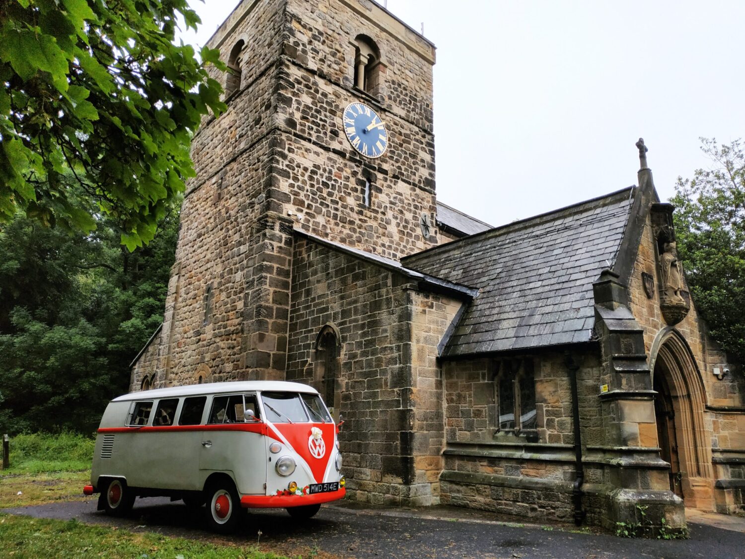 VW Wedding Car Hire Red and White VW Split Screen Outside Church